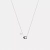 Collar con colgante de corazón esmaltado con nuestra firma