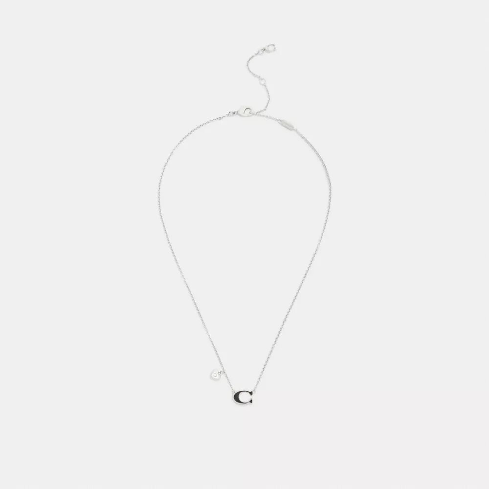 Collar con colgante de corazón esmaltado con nuestra firma
