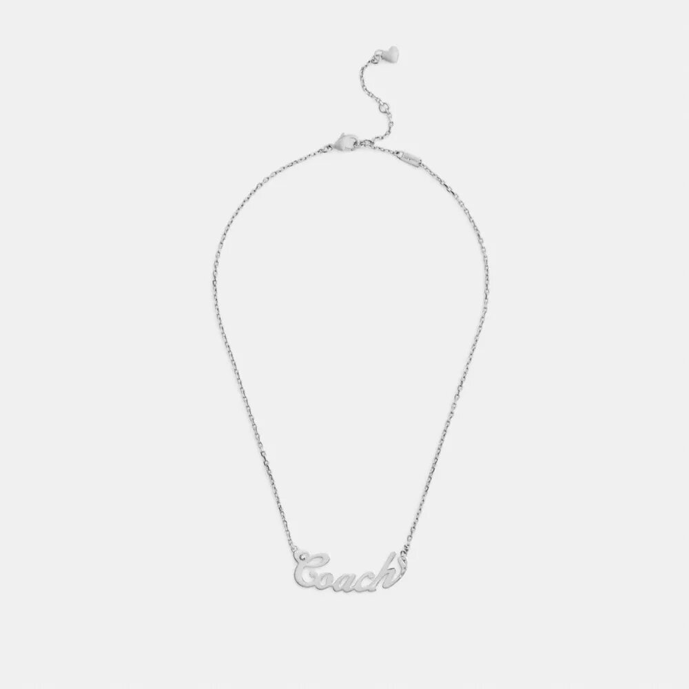Collar con placa de nombre en letra cursiva Coach