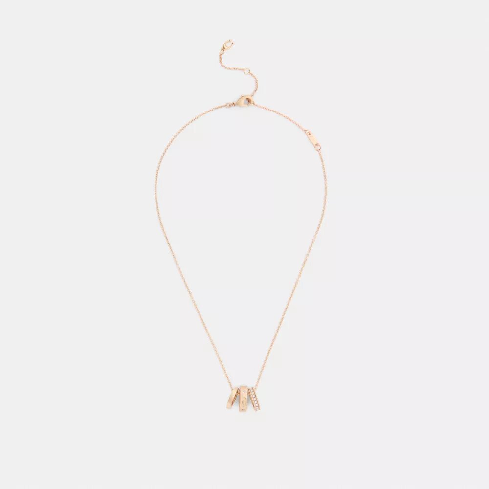 Collar con rondelles en forma de C repetidas