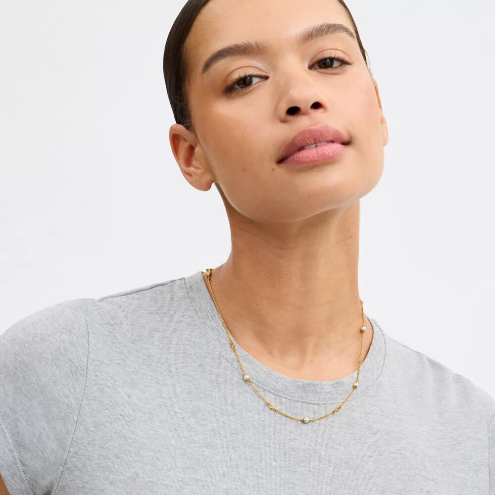 Collar de perlas en forma de C esculpida