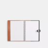 Cuaderno Disney X Coach en cuero regenerativo con Mickey Mouse