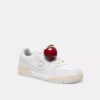 Dije de zapato con forma de manzana