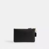 Disney X Coach: bolso de pulsera pequeño Essential con Pluto