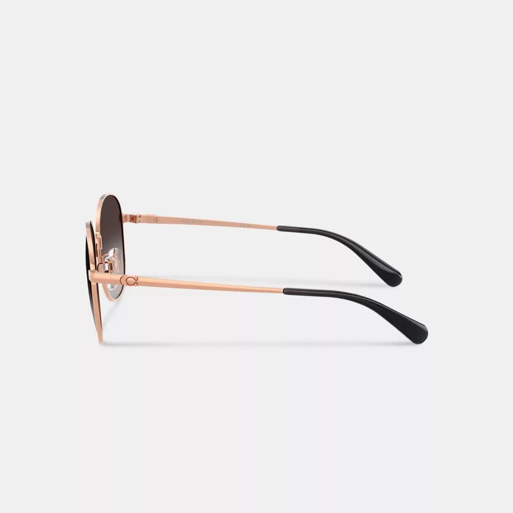 Gafas de sol redondas de metal con detalles en C
