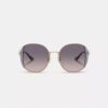 Lentes de sol redondas de metal con motivo de Horse and Carriage