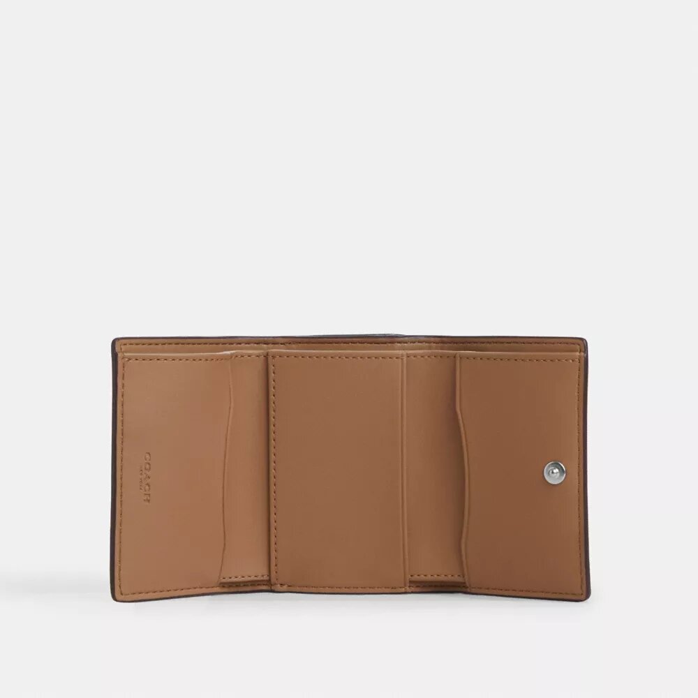Microbilletera en Signature Canvas