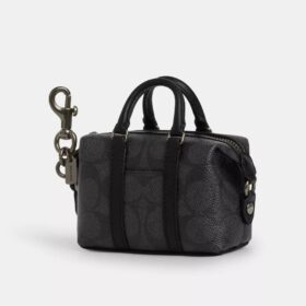 Mini colgante para bolsos Trekker en Signature Canvas