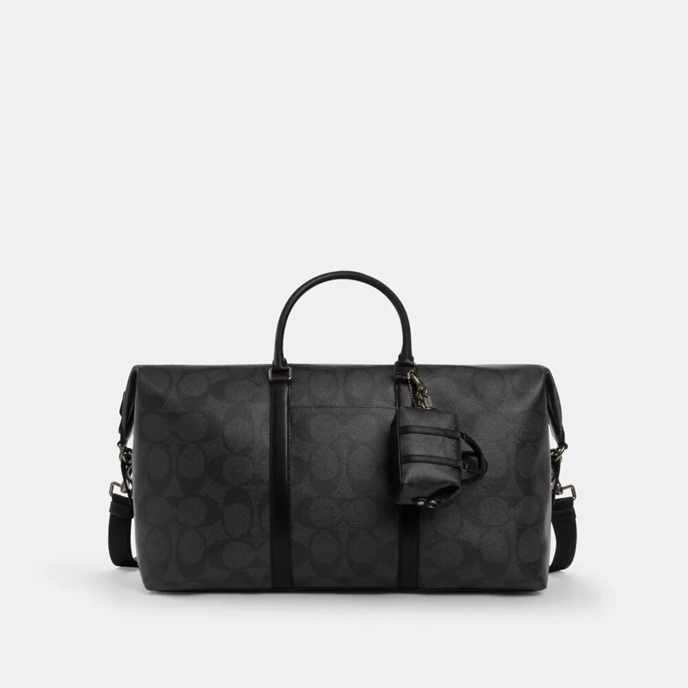 Mini colgante para bolsos Trekker en Signature Canvas