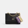 Mini colgantes para bolsos Klare con estampado floral en bloques