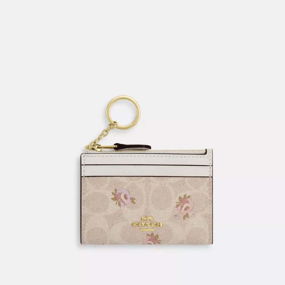 Mini estuche delgado para identificación en Signature Canvas con estampado floral