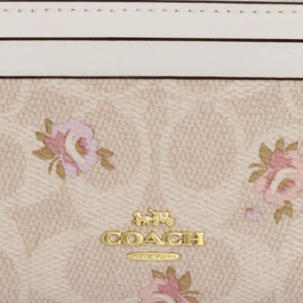 Mini estuche delgado para identificación en Signature Canvas con estampado floral