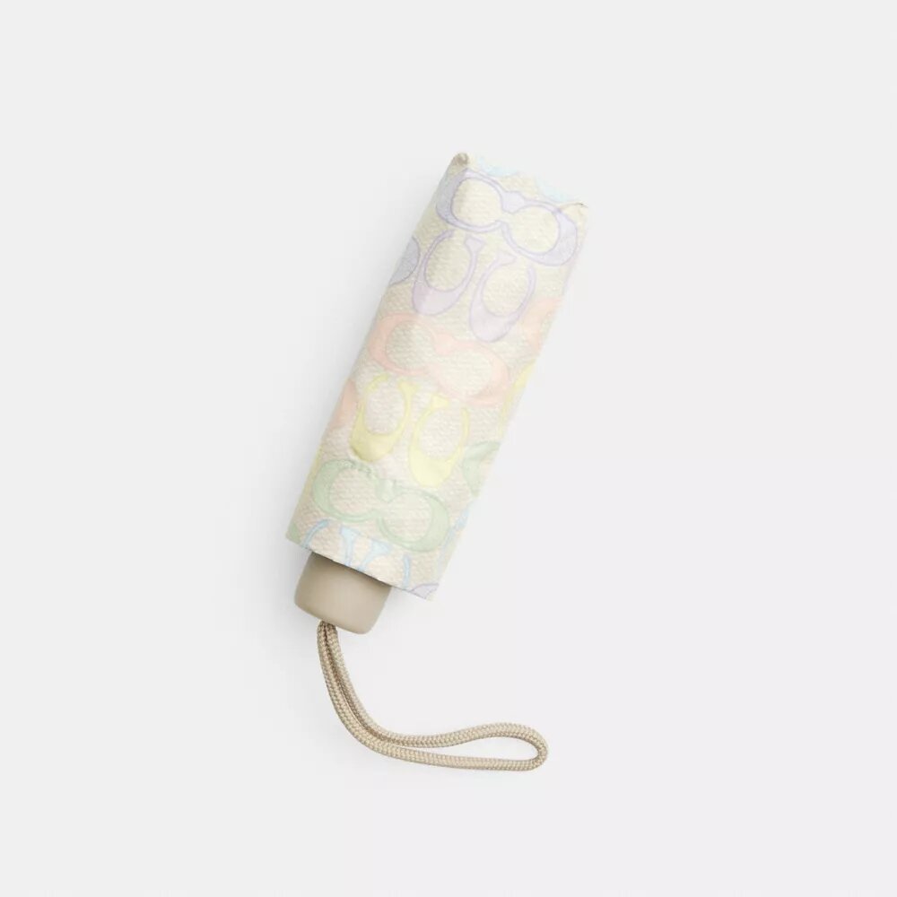 Mini paraguas con protección UV y estampado arcoíris exclusivo