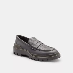 Mocasines con estampado emblemático