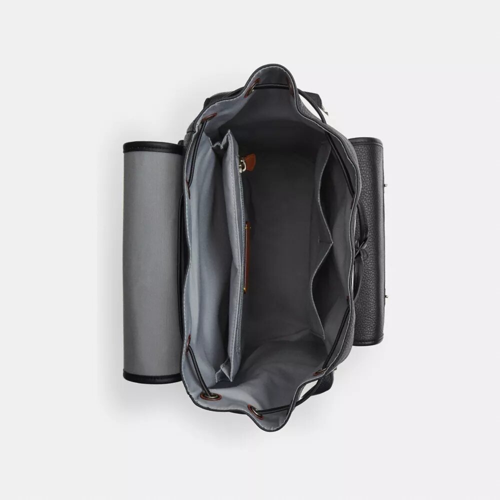 Mochila Sprint en Signature Canvas con bloques de color