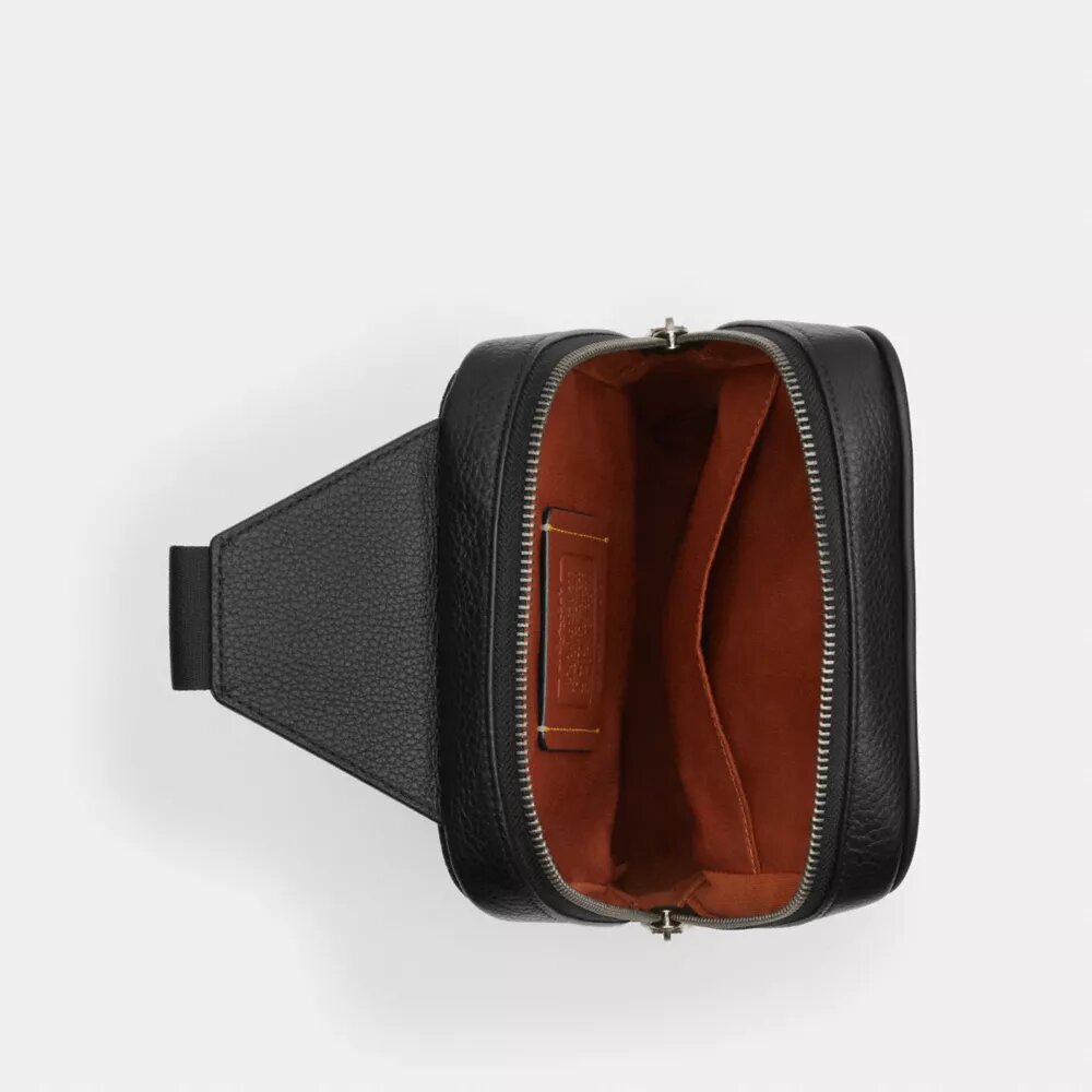 Mochila Sullivan en Signature Canvas con parches
