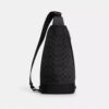 Mochila tipo bandolera Dominic en Signature Canvas