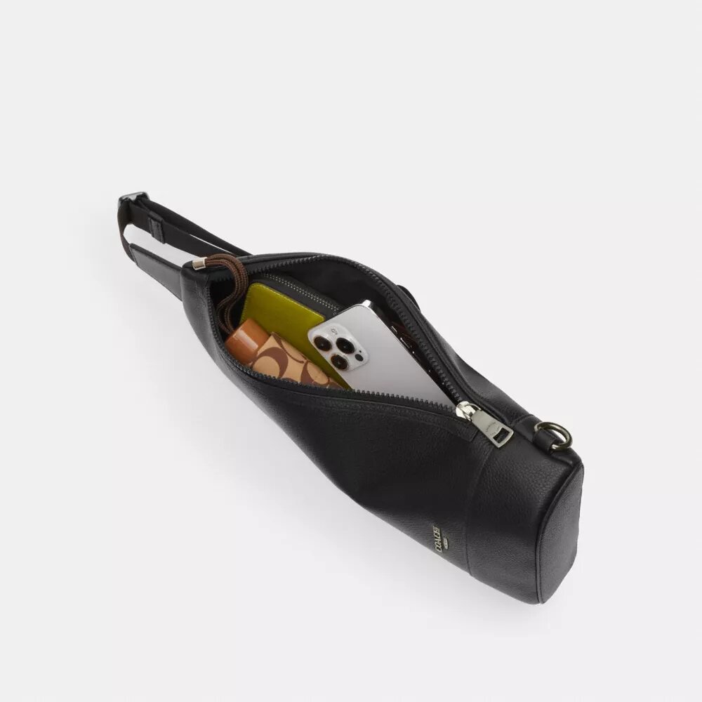 Mochila tipo bandolera Dominic en Signature Canvas