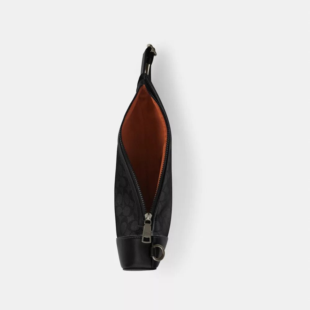 Mochila tipo bandolera Dominic en Signature Canvas