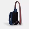 Mochila tipo bandolera Racer con correas a rayas estilo universitario