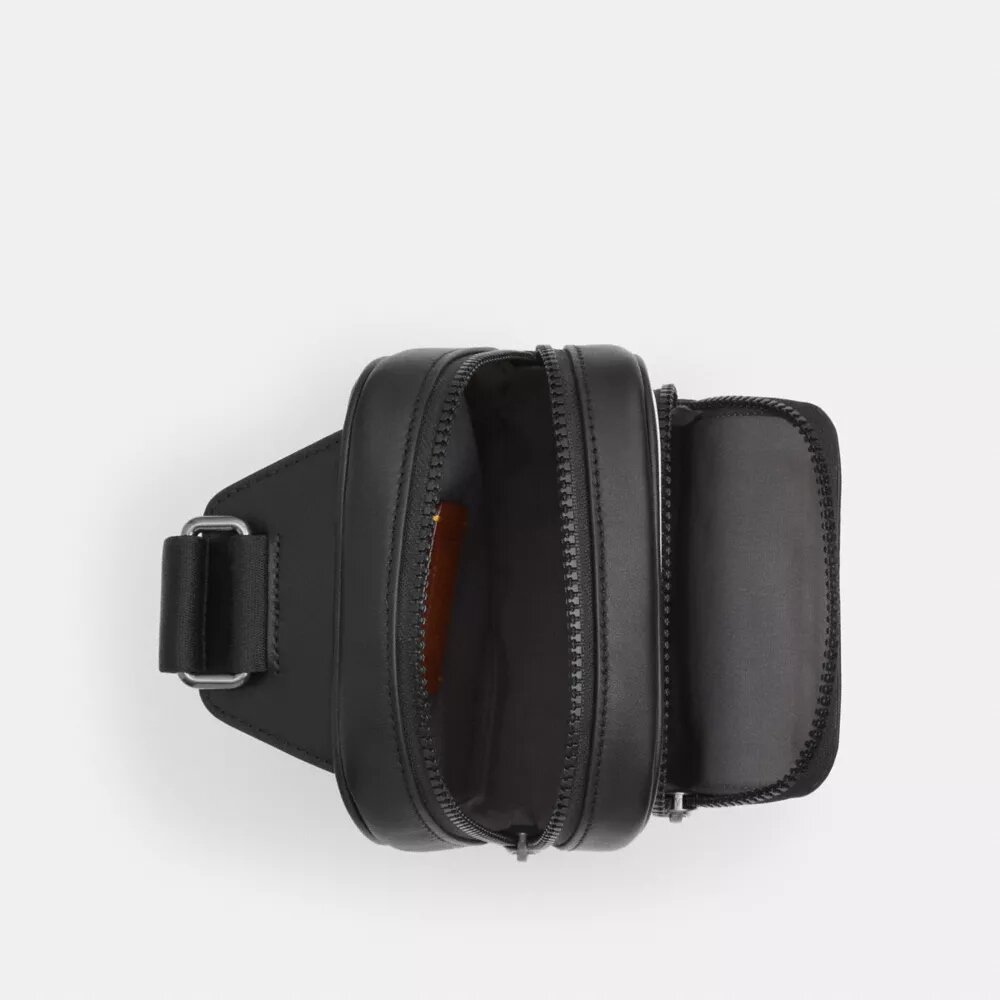 Mochila tipo bandolera Racer en Signature Canvas