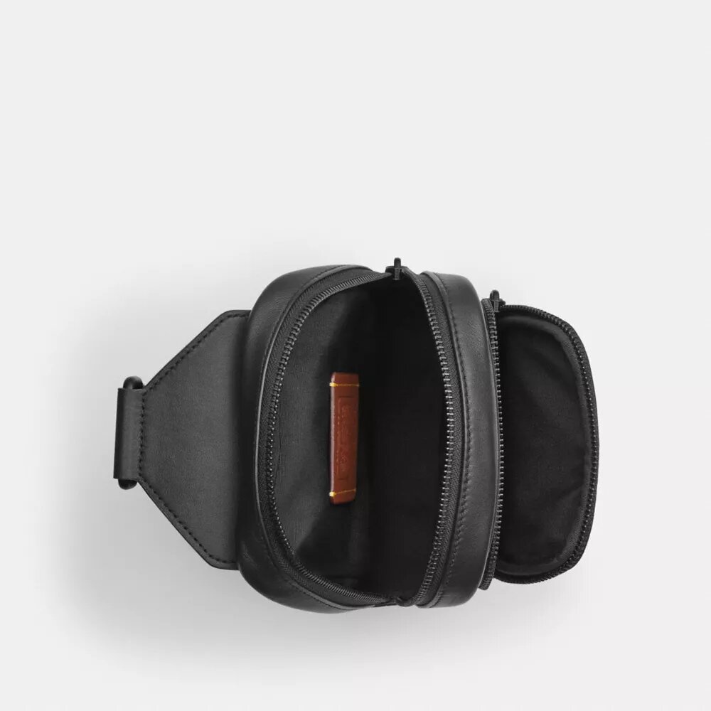 Mochila tipo bandolera Racer en Signature Canvas