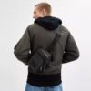 Mochila tipo bandolera Racer en Signature Canvas