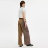 Pantalones entallados con estampado de cuadros combinados