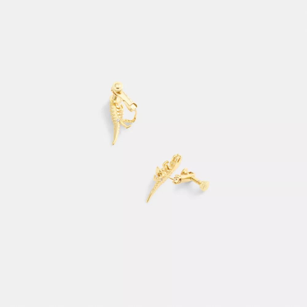 Pendientes de clip con diseño de esqueleto de Rexy
