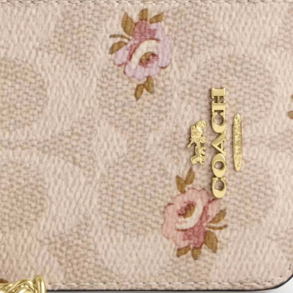 Portatarjetas con cremallera en Signature Canvas con estampado floral
