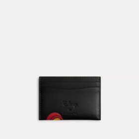 Portatarjetas Essential de Disney X Coach con Pluto