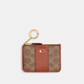 Portatarjetas Essential Mini en Signature Canvas