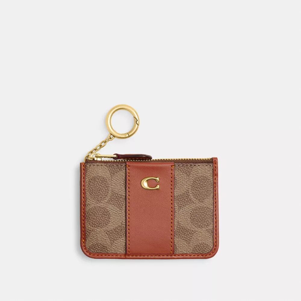 Portatarjetas Essential Mini en Signature Canvas