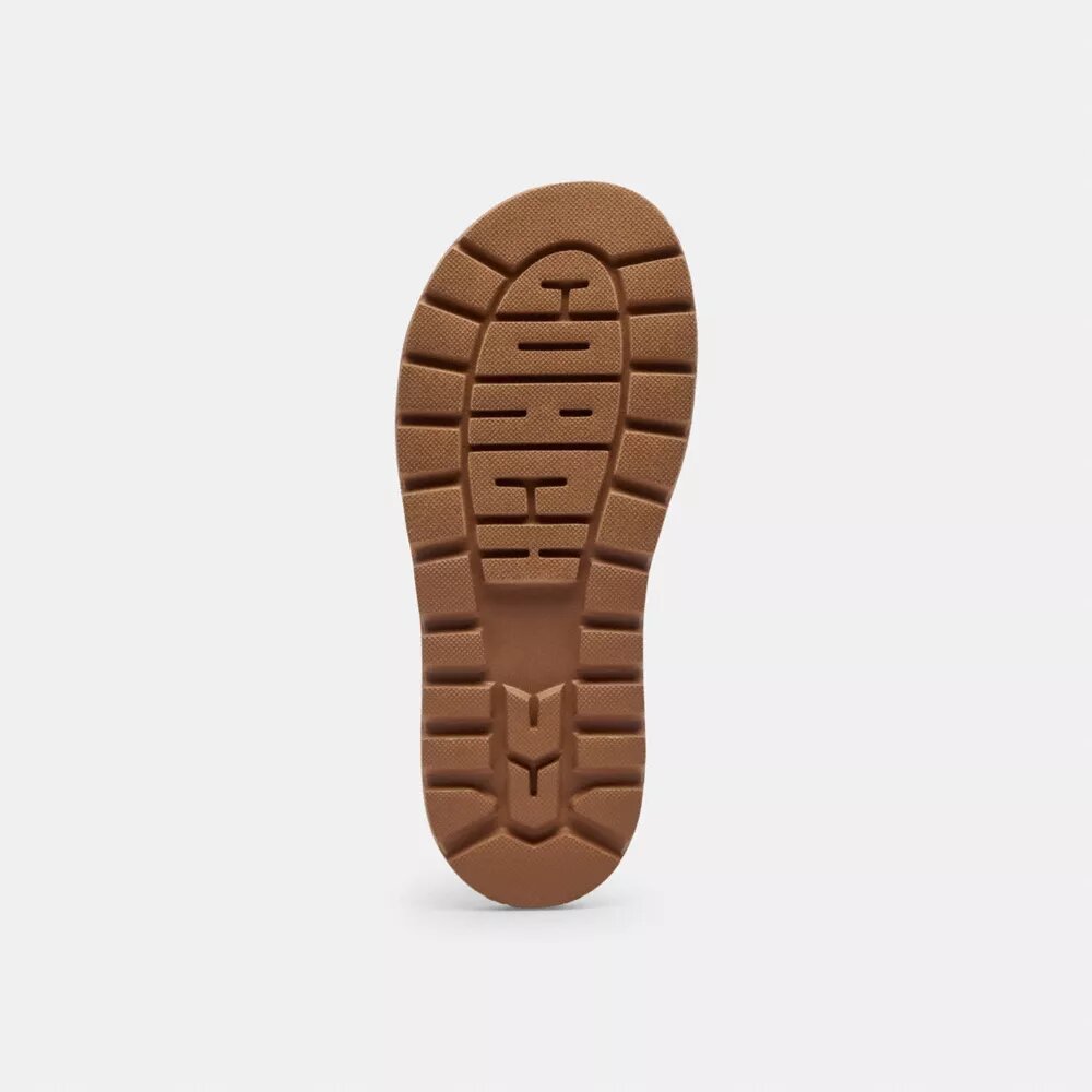 Sandalias Brynn tipo chanclas sin cordones en jacquard con cristales característico
