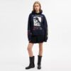 Sudadera con capucha holgada y collage de dinosaurios en algodón orgánico