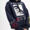 Sudadera con capucha holgada y collage de dinosaurios en algodón orgánico