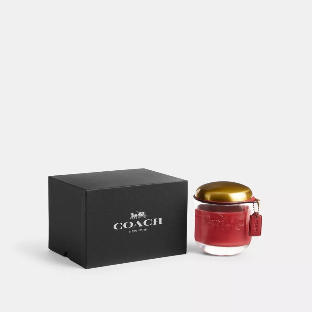 Vela navideña de Coach
