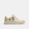 Zapatillas altas de Disney x Coach con estampado de calcomanías