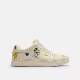Zapatillas altas de Disney x Coach con estampado de calcomanías