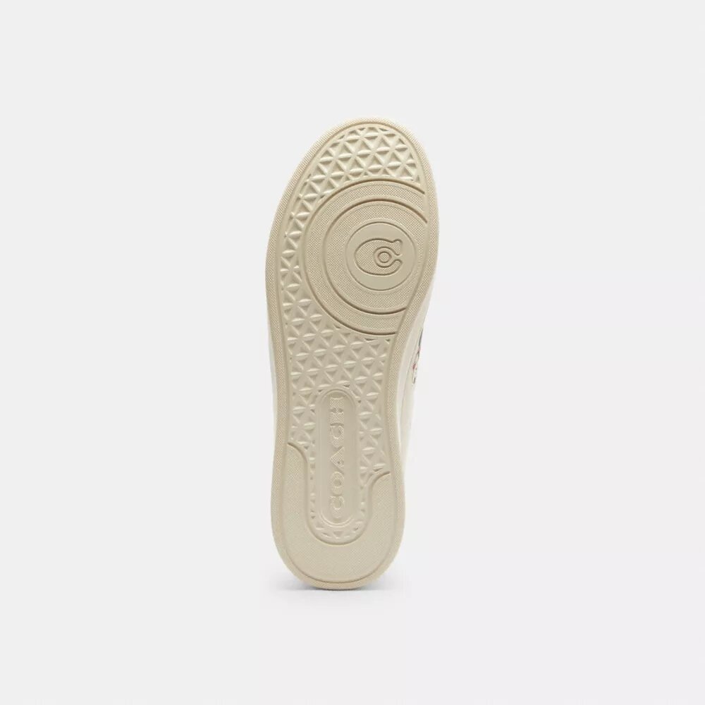 Zapatillas altas de Disney x Coach con estampado de calcomanías
