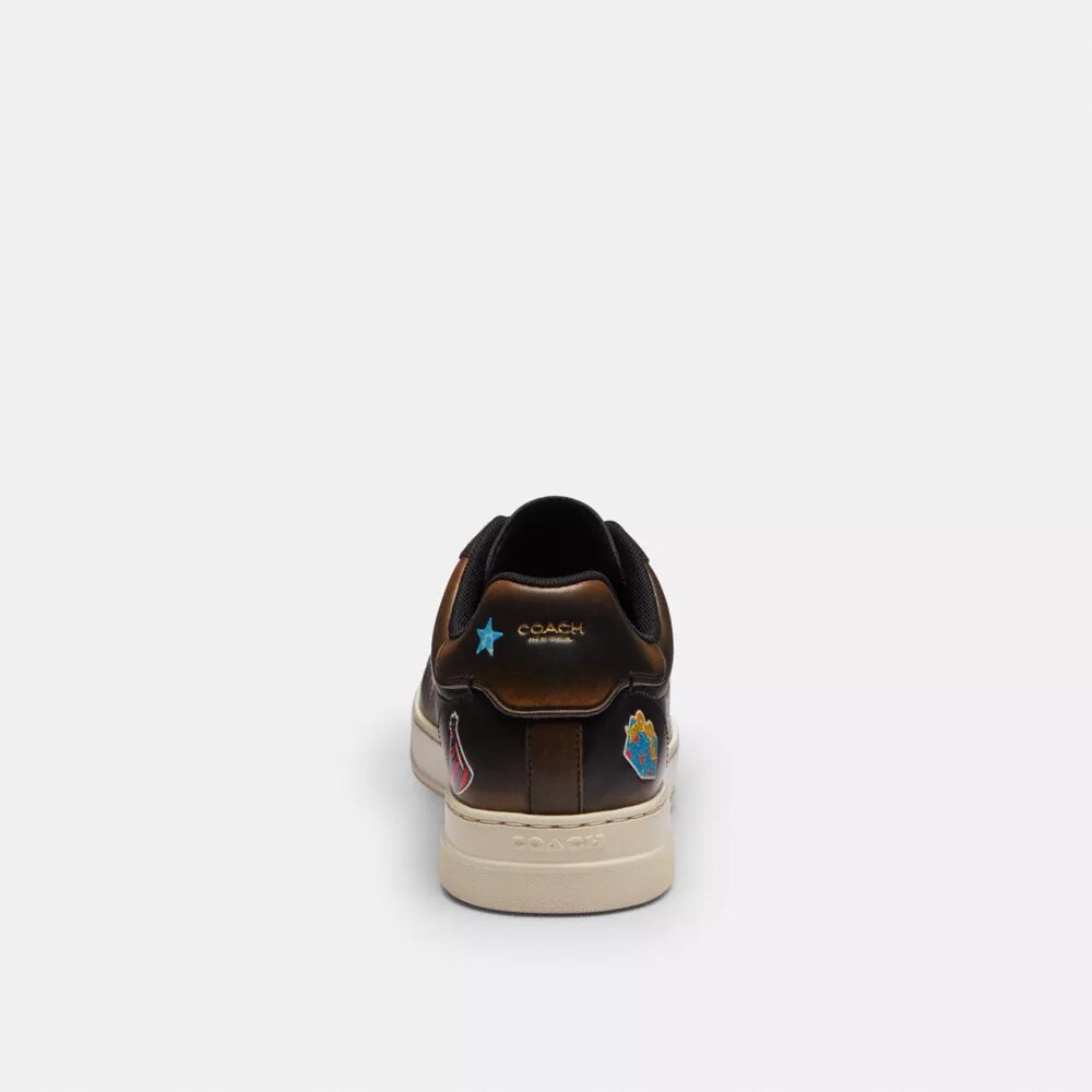 Zapatillas altas Rexy del 10.º aniversario con estampado de calcomanías