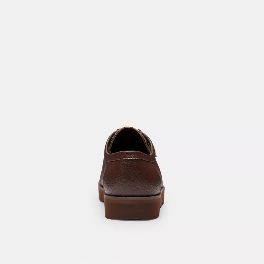 Zapatos chukka con Signature Canvas