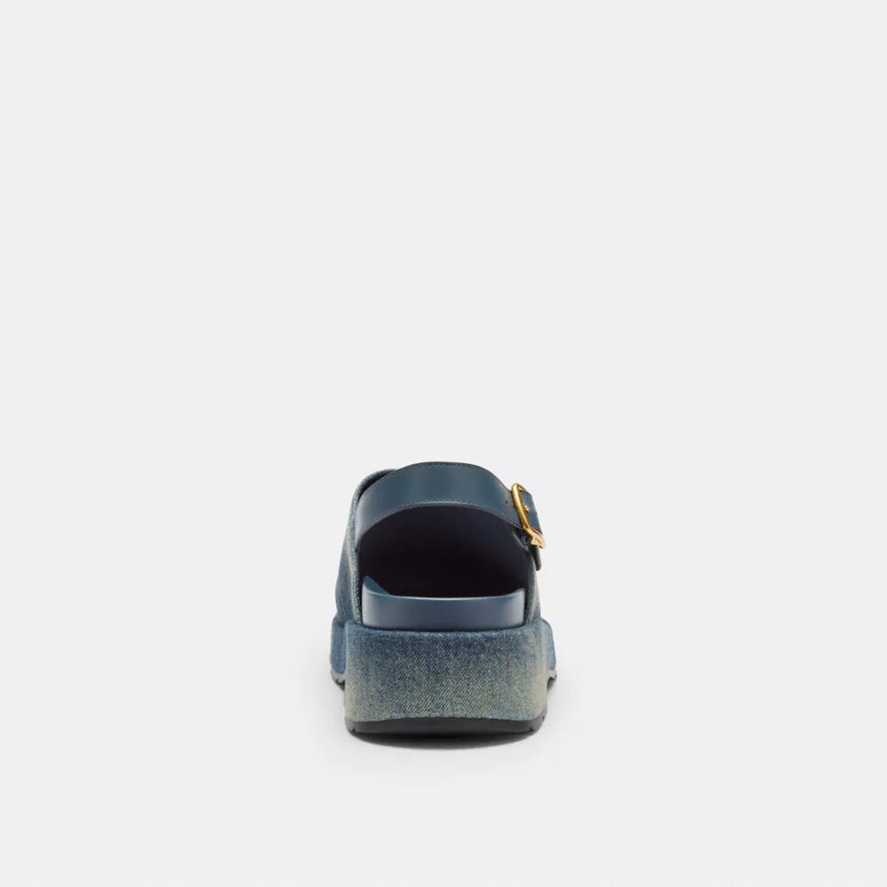 Zuecos de plataforma en forma de C en denim desgastado