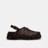Zuecos de plataforma en forma de C y estampado de leopardo