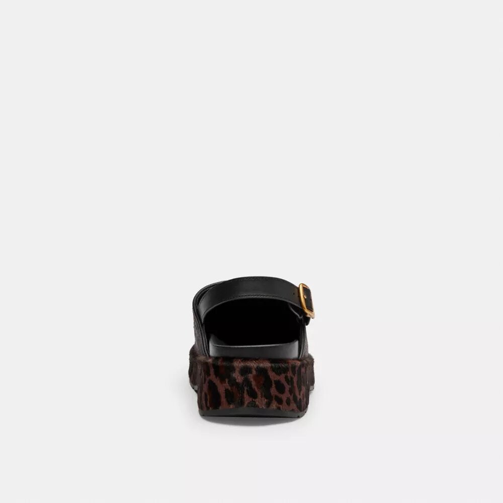 Zuecos de plataforma en forma de C y estampado de leopardo